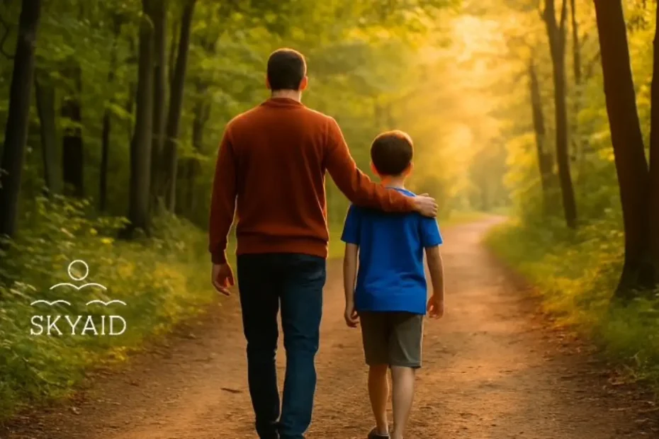 Hombre y niño caminando juntos por un bosque, símbolo de la masculinidad consciente y equilibrio emocional